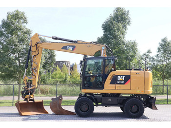 Pelle sur pneus CATERPILLAR M318F