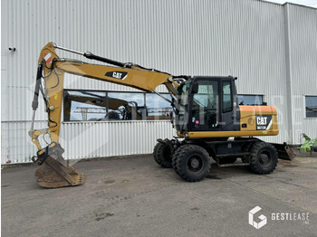 Pelle sur pneus CATERPILLAR M313D