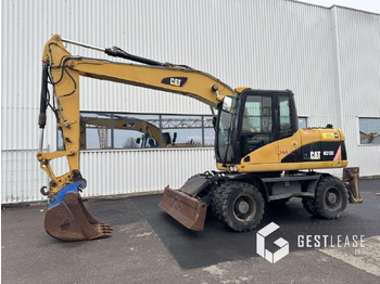 Pelle sur pneus CATERPILLAR M313D