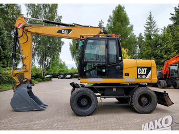 Pelle sur pneus CATERPILLAR M313D