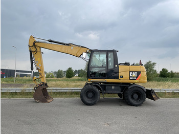 Pelle sur pneus CATERPILLAR M313D