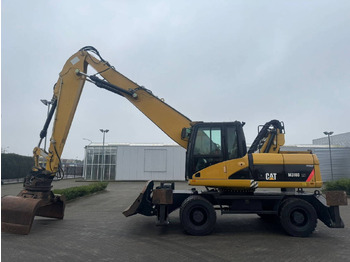 Pelle sur pneus CATERPILLAR M318D MH