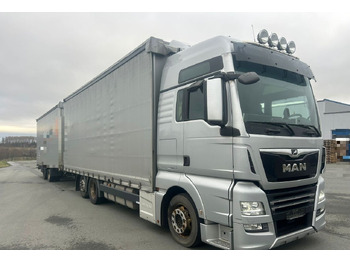 Camion à rideaux coulissants MAN TGX 26.460