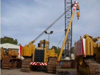 Poseur de canalisations CATERPILLAR