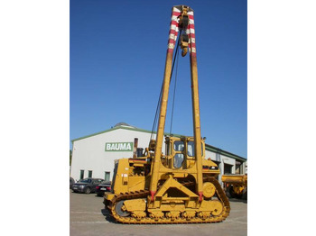 Poseur de canalisations CATERPILLAR