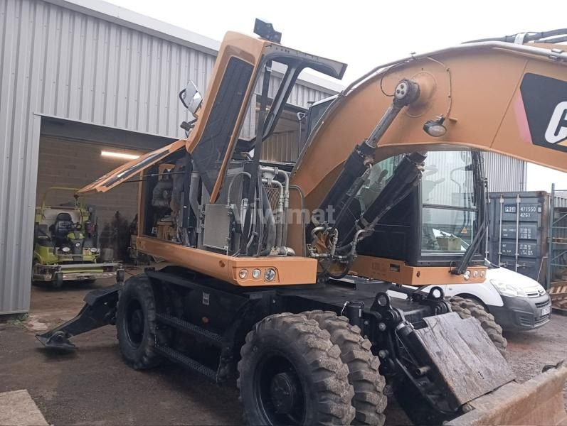 Pelle sur pneus Caterpillar M314F: photos 13